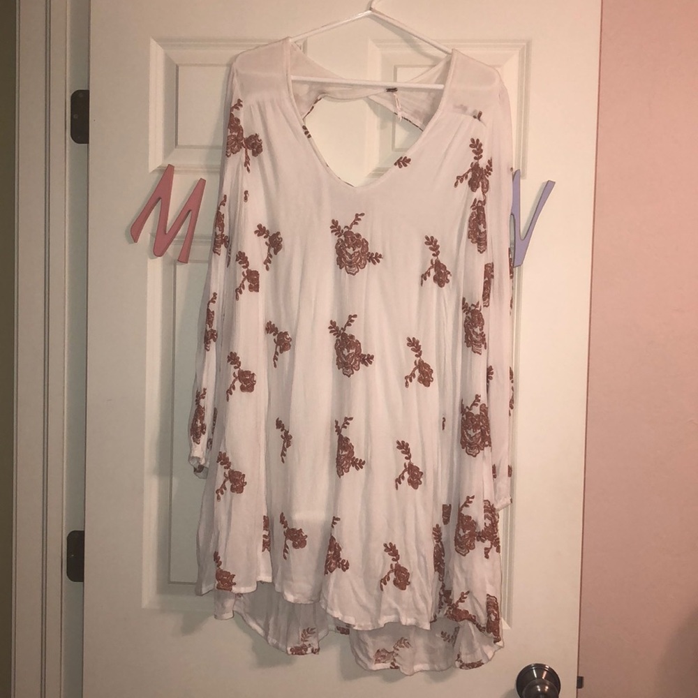 white and orange free people dress.